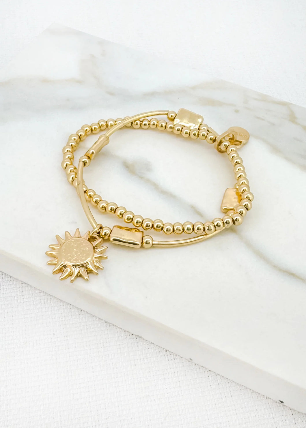 Layered Bracelet with Sunburst Charm