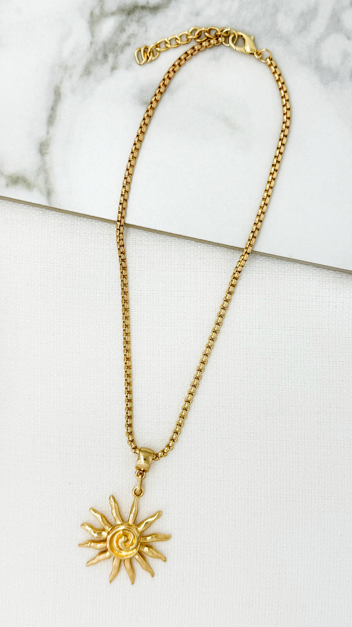 Gold necklace with Sunburst Pendant