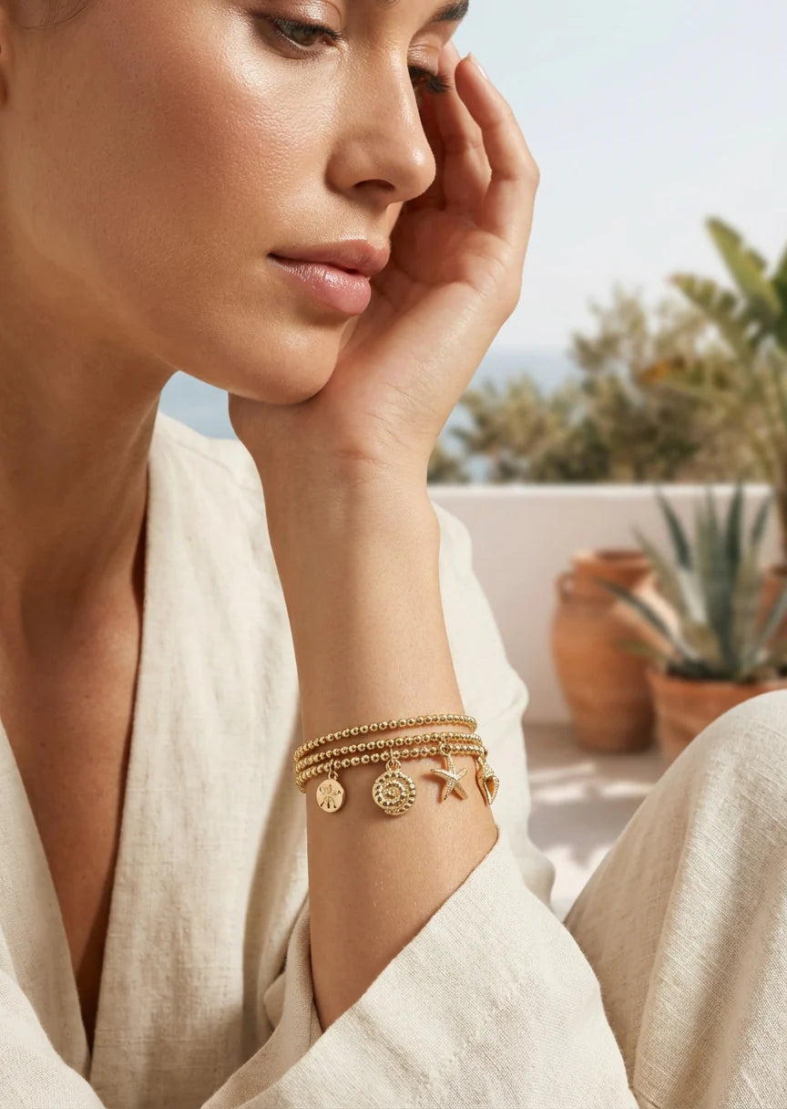 Gold Triple Stretch Bracelet with Sea Charms