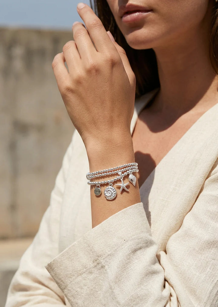 Silver Triple Stretch Bracelet with Sea Charms